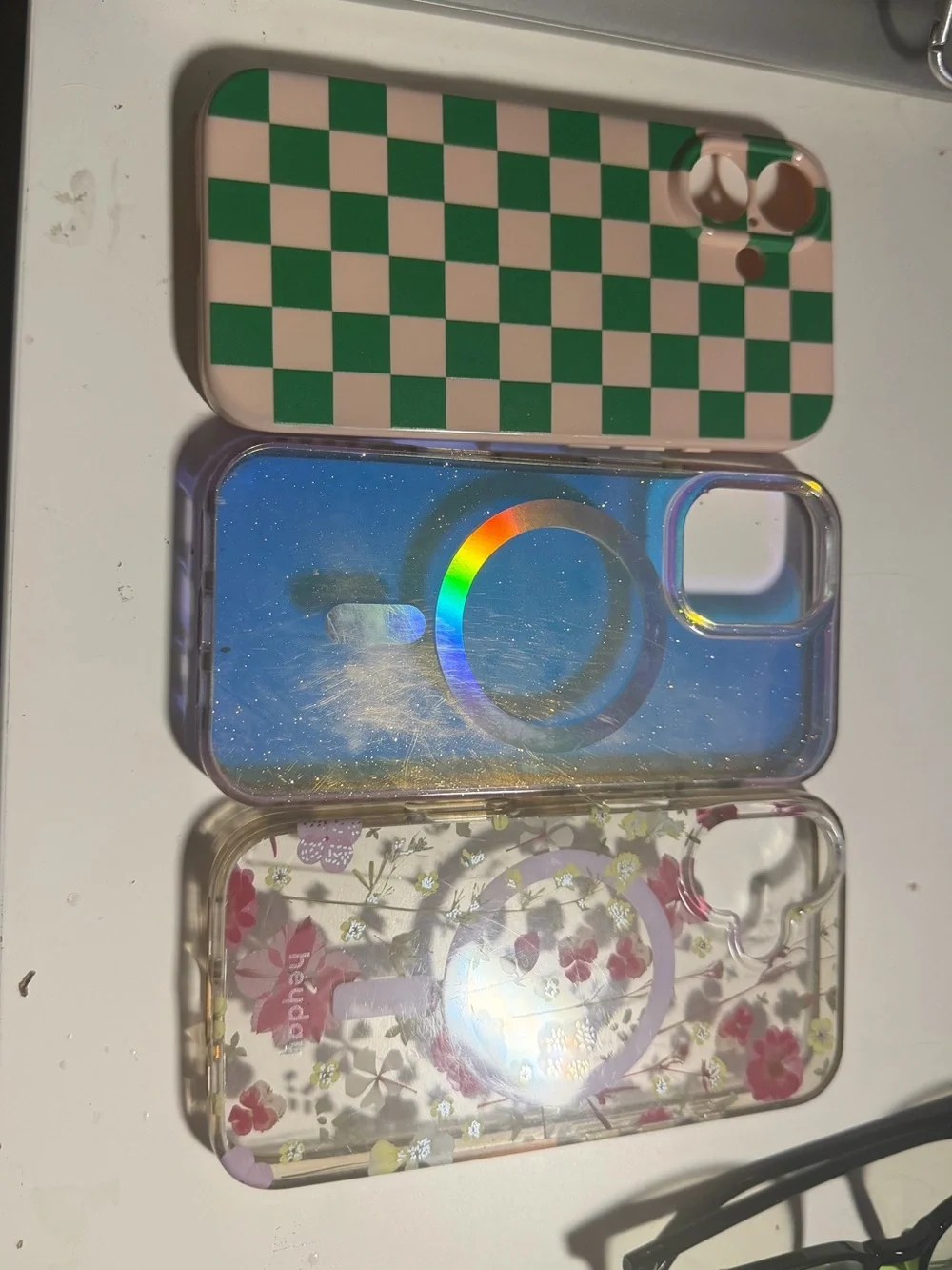 iPhone 16 Phone Case Bundle - Green Checkered, Iridescent Blue, Floral Clear